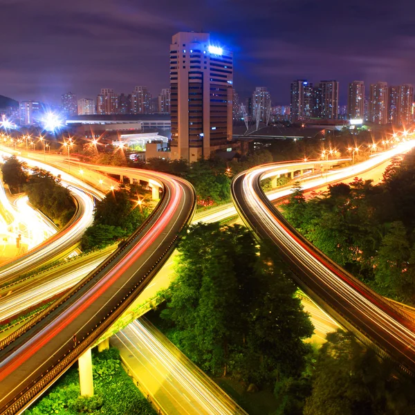 Traffic to city with blur motion car light — Stock Photo, Image