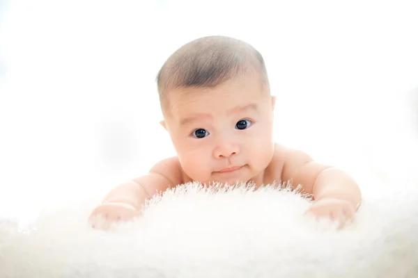 Cute baby lie on bed — Stock Photo, Image