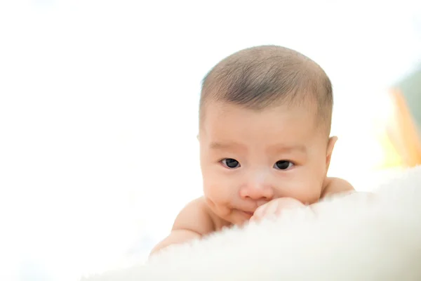 Cute baby lie on bed — Stock Photo, Image