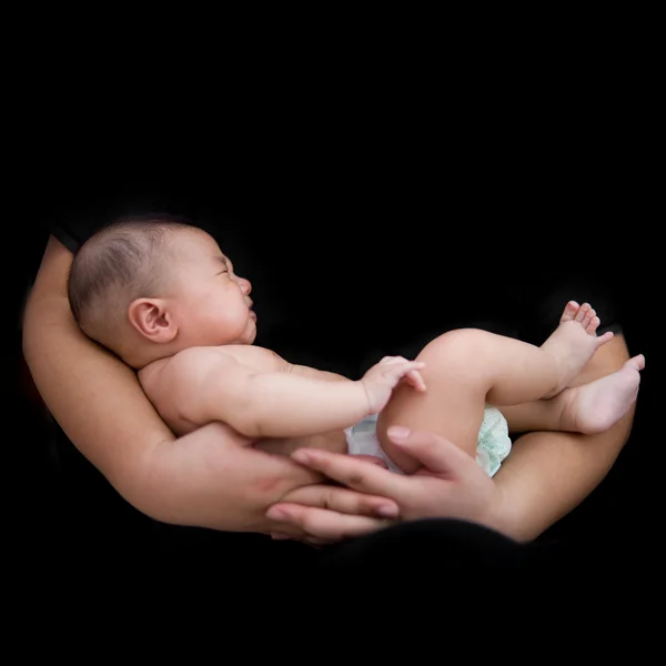 Halterung mit Baby mit schwarzem Hintergrund — Stockfoto