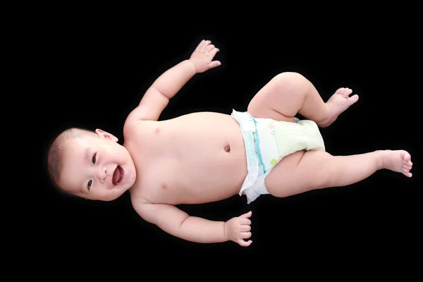 Aranyos ázsiai baba fekete háttér — Stock Fotó