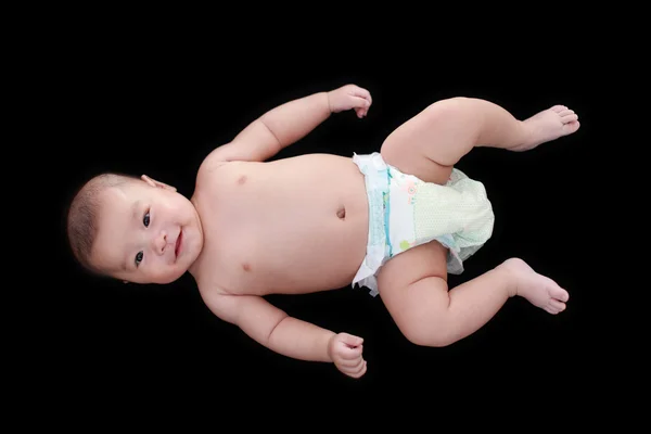 Carino asiatico bambino con nero fondo — Foto Stock