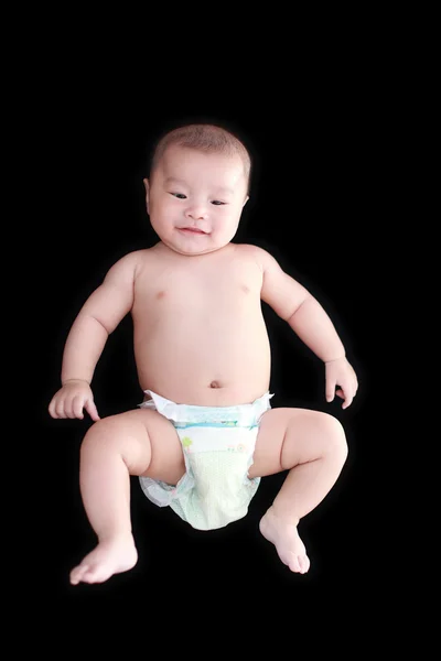 Niedliche asiatische Baby mit schwarzen Hintergrund — Stockfoto