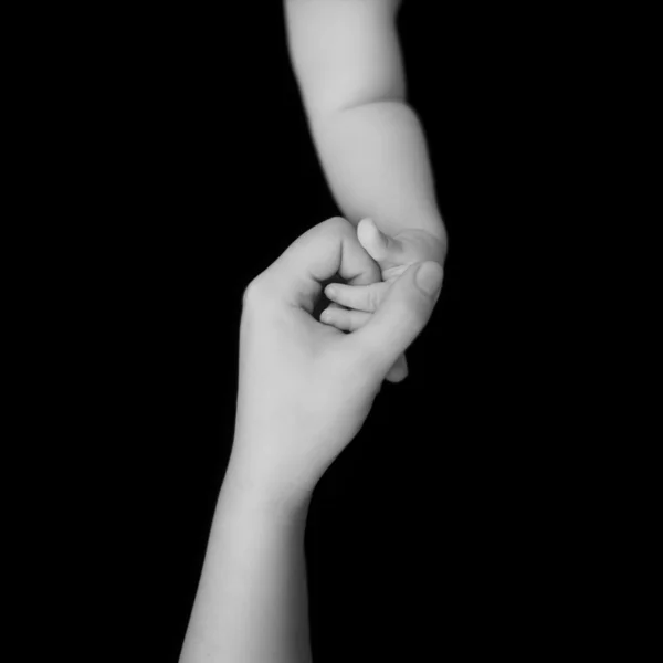 Mother's and baby's hands — Stock Photo, Image