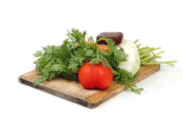 Gemüse auf Hüpfblock mit weißem Hintergrund — Stockfoto