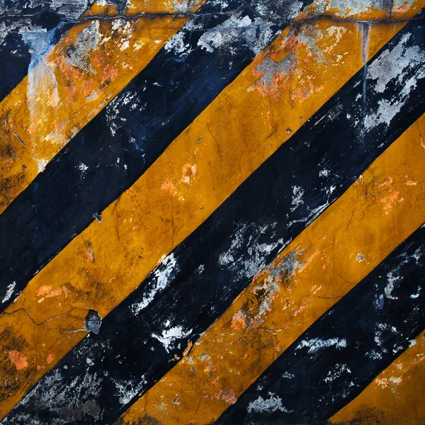 Černé nebezpečí žluté pruhy — Stock fotografie