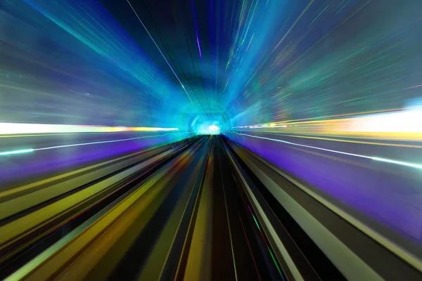 Moving in tunnel with blur light — Stok fotoğraf