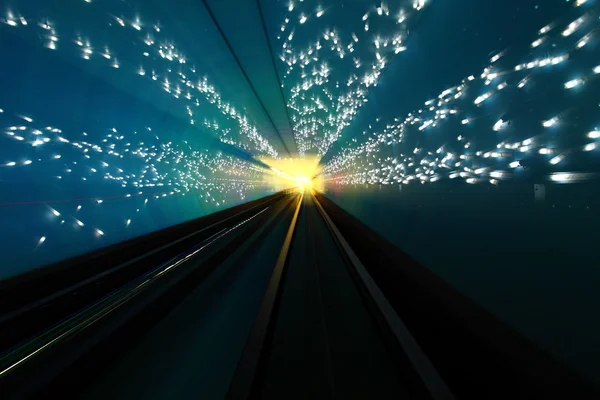 Moving in tunnel with blur light — Stock Photo, Image