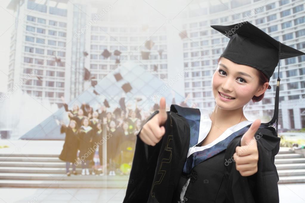 Asian graduate with big thumb
