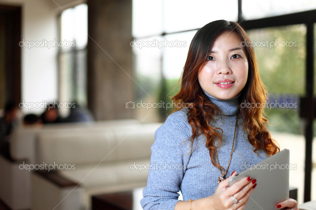 Business woman work with pad