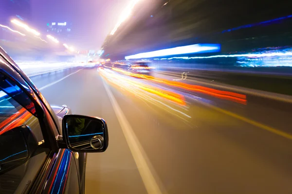 Car driving fast Stock Photo by ©zhudifeng 29100407
