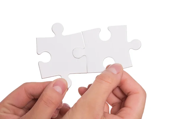 Human hand holding puzzles — Stock Photo, Image