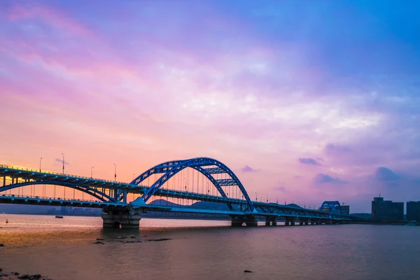 Night bridge with sunset — Stock Photo, Image