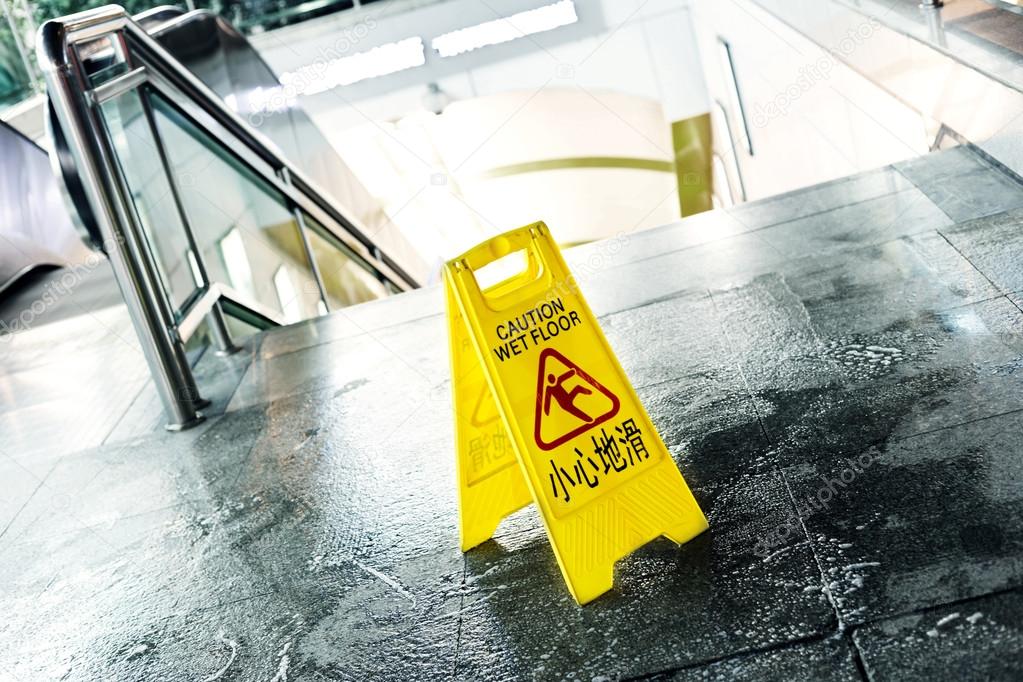 Sign showing warning of caution wet floor