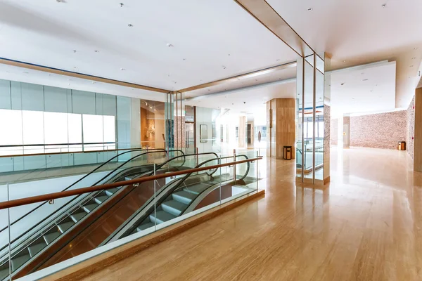 Corridor of hotel with escalator — Stock Photo, Image