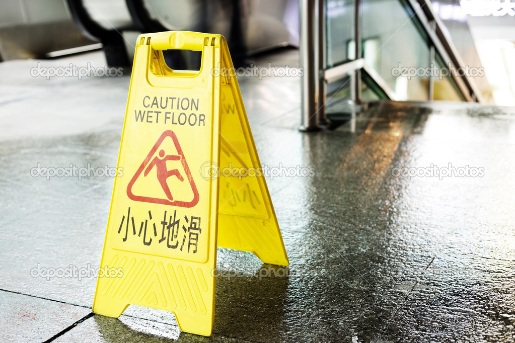 Sign showing warning of caution wet floor