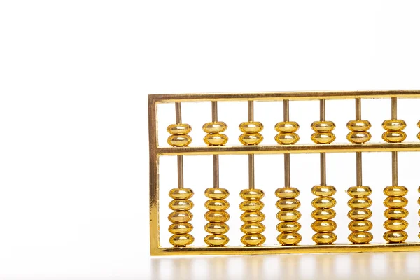 Golden abacus izolat — Zdjęcie stockowe
