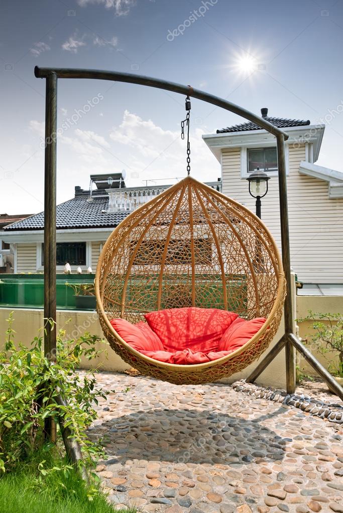 Rattan hanging chair Stock Photo by ©zhudifeng 39293775