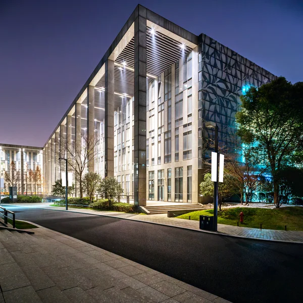 Exterior of modern building at night — Stock Photo, Image