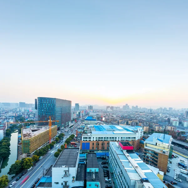 Modern city with sunset — Stock Photo, Image