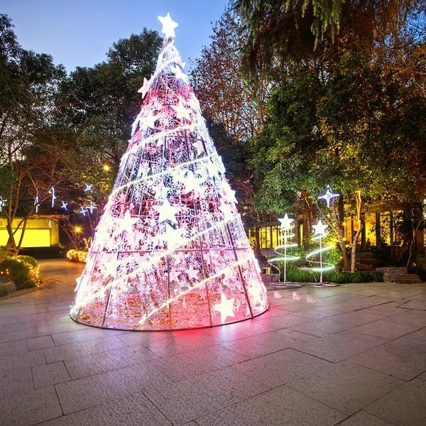 Christmas tree at night, in plaza — Stock Photo, Image
