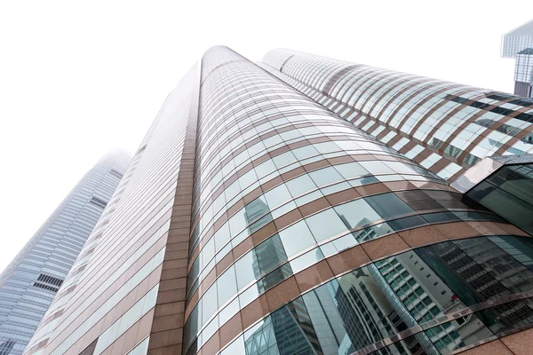 Modern glass silhouettes of skyscrapers in the city — Stock Photo, Image