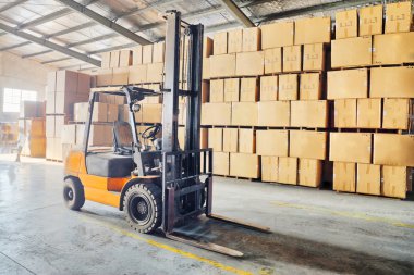 Large modern warehouse with forklifts  clipart