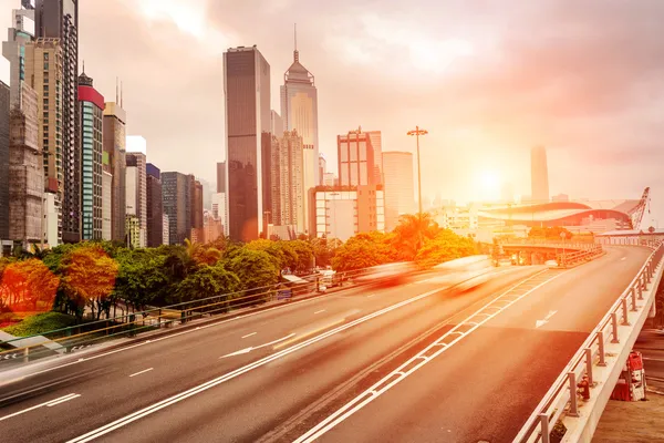 Traffic in city Hong Kong with sunset — Stock Photo, Image