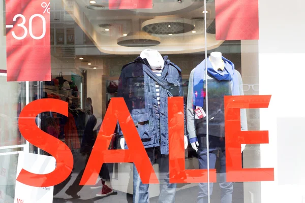 Sale Sign In A Clothing Store Window — Stock Photo, Image
