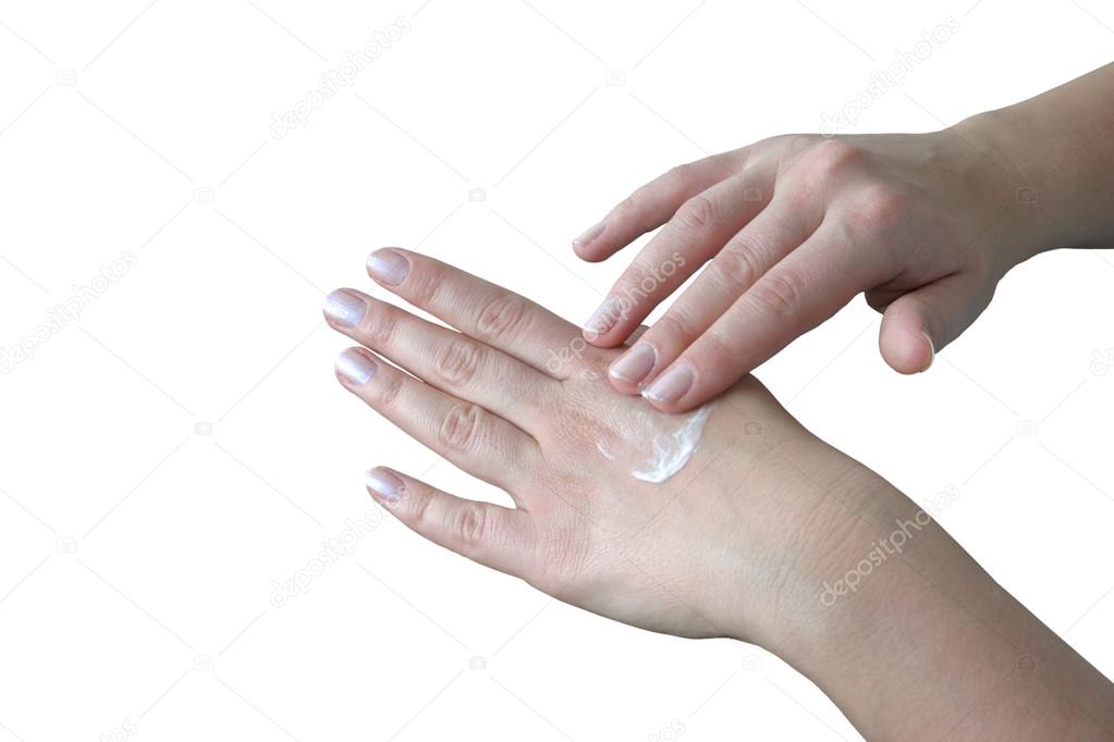 Hands and cream over white