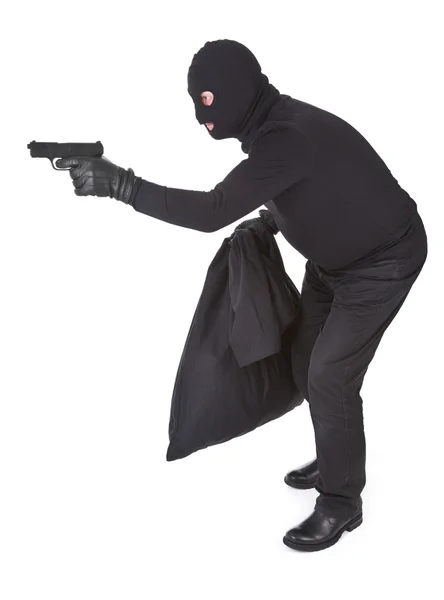 Robber with gun — Stock Photo, Image