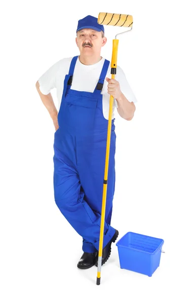 Painter in blue dungarees — Stock Photo, Image