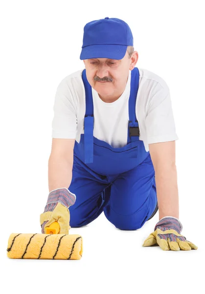 House painter is painting floor — Stock Photo, Image