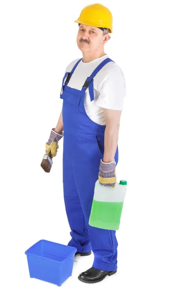 Manual worker with green liquid — Stock Photo, Image