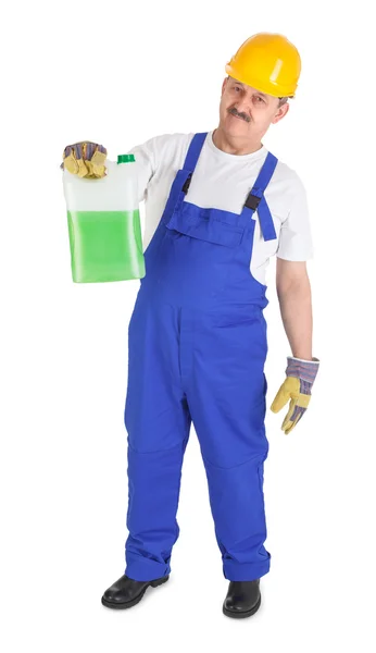 Manual worker with green liquid — Stock Photo, Image