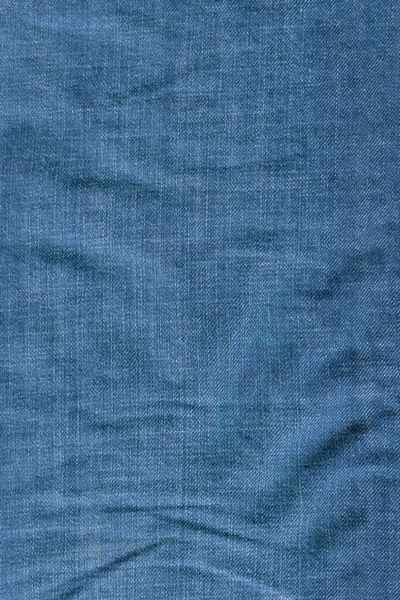 Folded denim texture — Stock Photo, Image