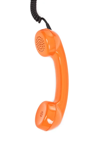 Orange telephone receiver over white — Stock Photo, Image