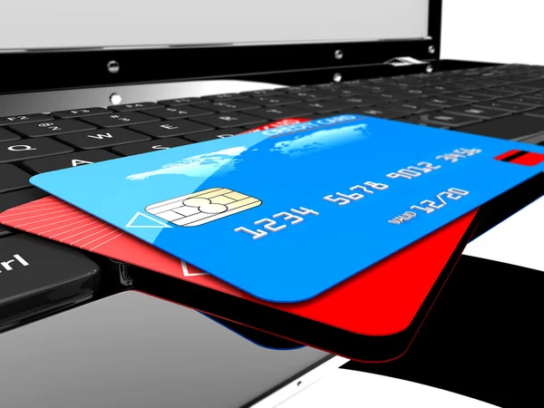 Twee credit cards op laptop — Stockfoto