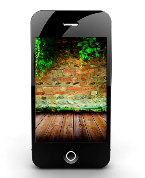 Smartphone con muro di mattoni — Foto Stock