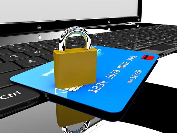 Credit card and lock on laptop — Stok fotoğraf
