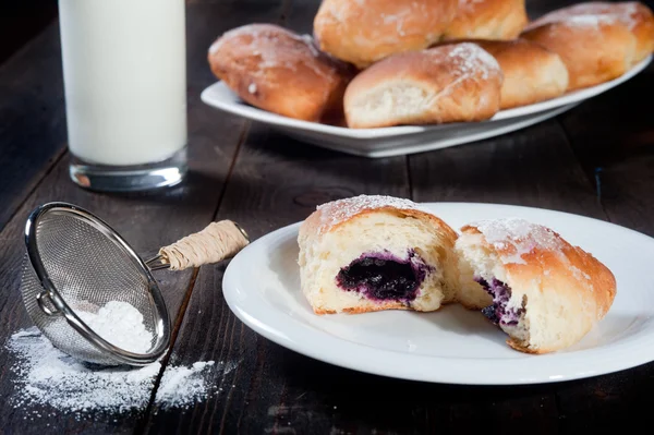 Sweet bun with blueberries jam — Stock Photo, Image