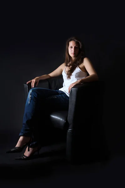 Full Length Portrait Beautiful Brunette Woman Sitting Black Armchair Front — Stock Photo, Image