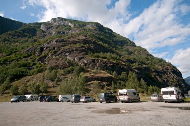 Motorhomes at campsite by Sognefjord, Norway clipart