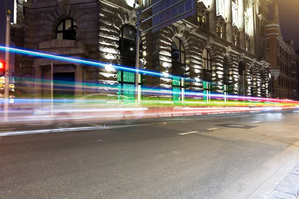 Light trails on old building — Stock Photo, Image