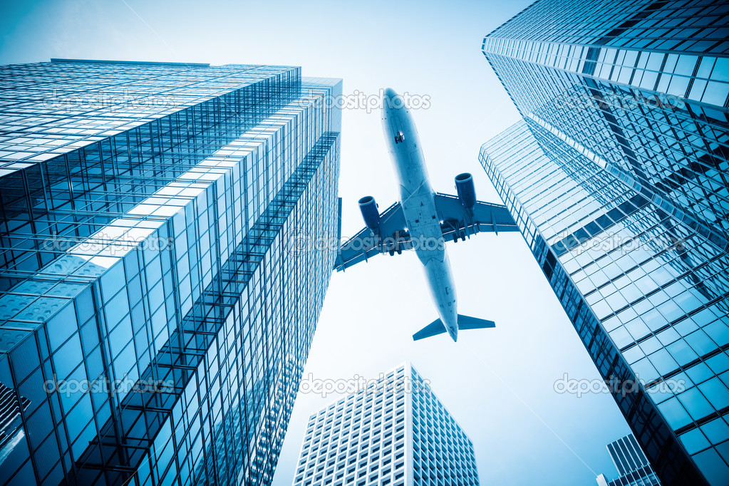 airplane and modern office building