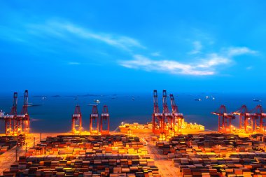 container terminal at nightfall clipart