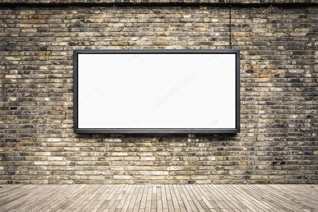 blank billboard on old brick wall
