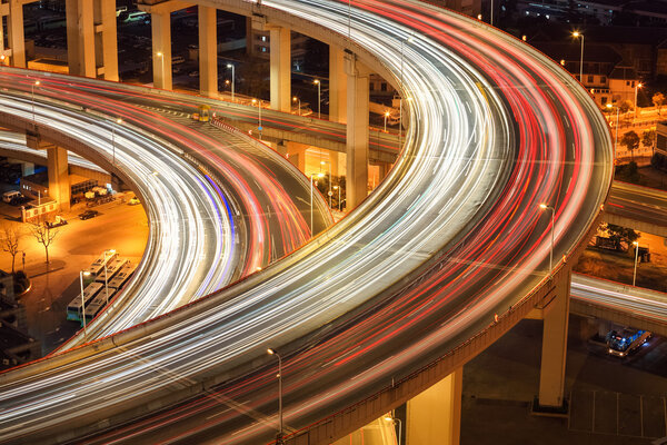 closeup of the light trails on overpass