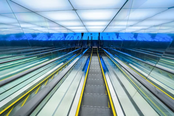 Futuristic downward escalator Royalty Free Stock Photos