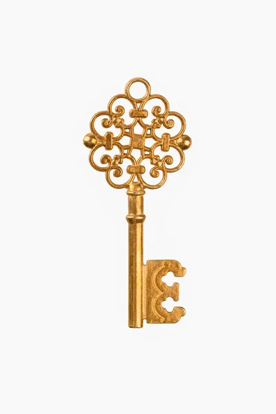 A golden key isolated — Stock Photo, Image